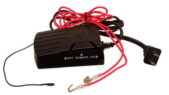 Black remote receiver module with red and black wire leads and power plug