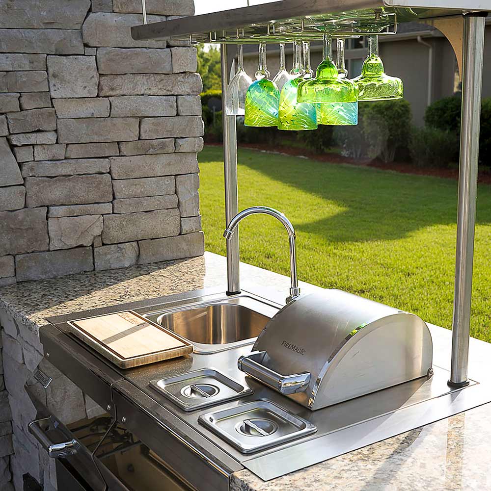 Fire Magic stainless beverage butler with faucet, sink, and bottle display shelf