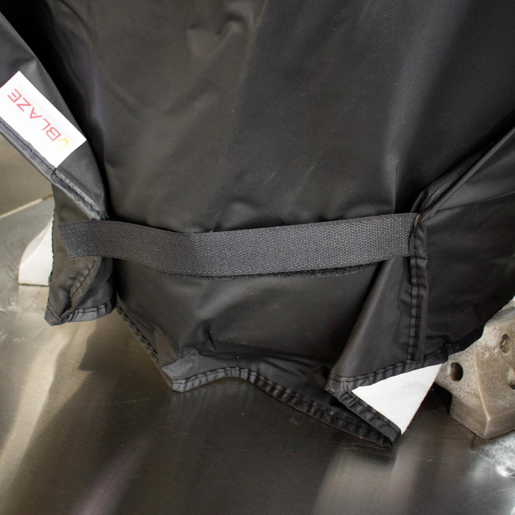 Black vinyl grill cover with side pull strap and elastic bottom hem