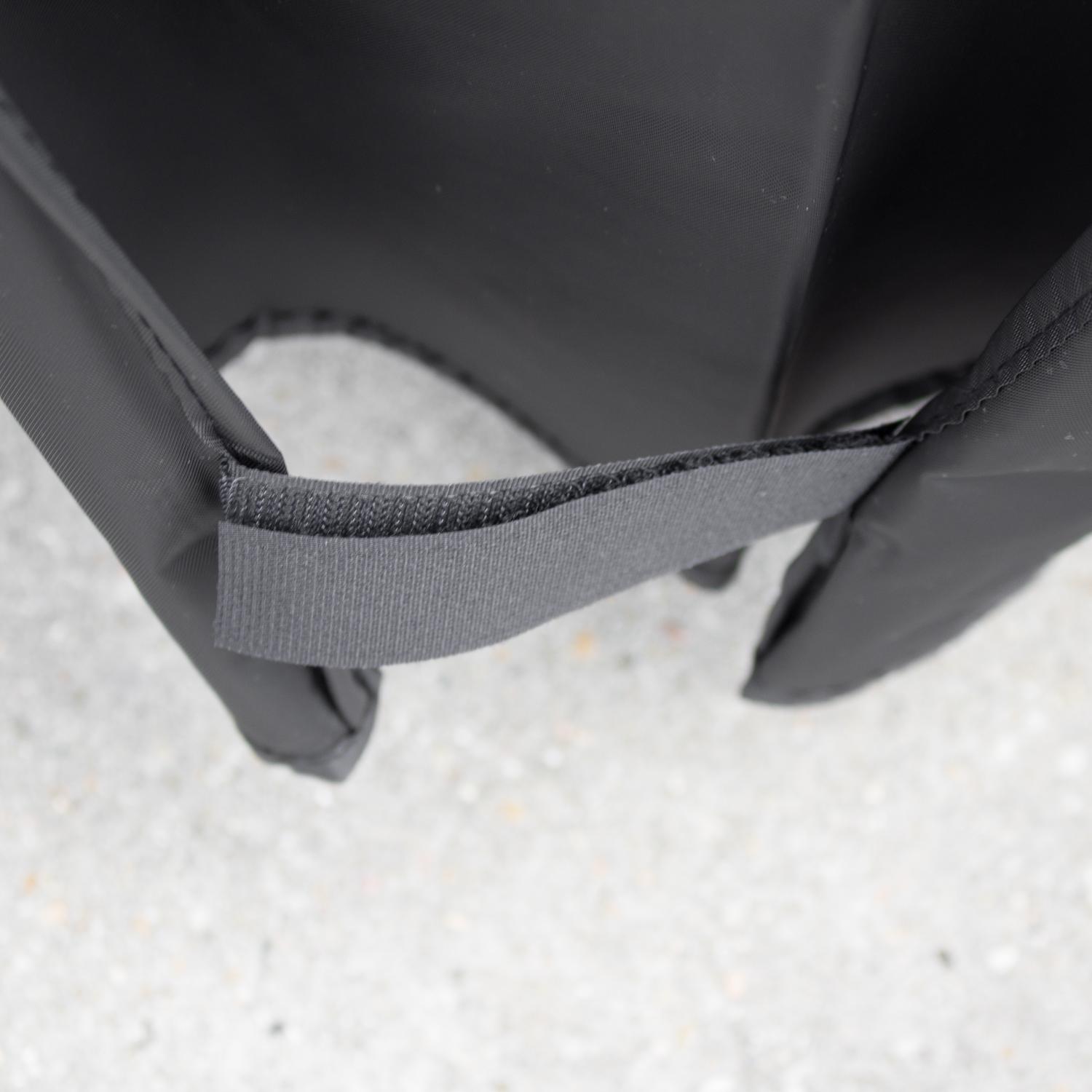 Vinyl grill cover with gray elastic strap hem edge detail