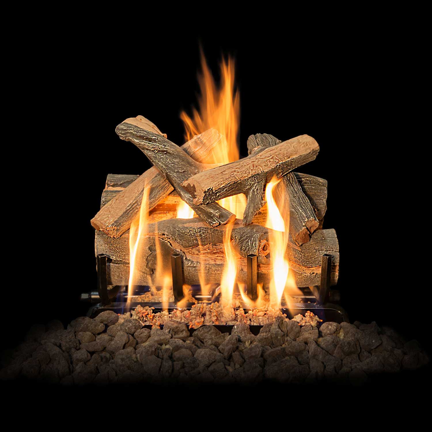 Juniper gas log set with tall flames rising from stacked split logs over lava rocks