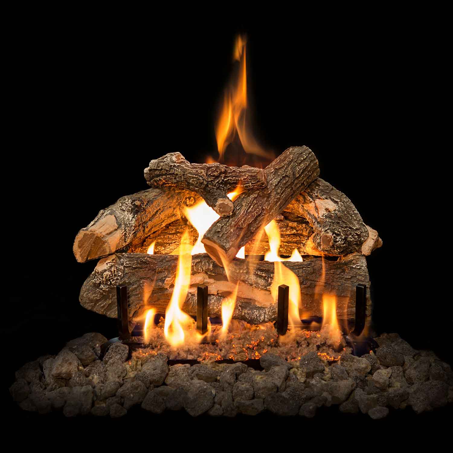Vented gas log set with weathered oak logs, burning flames and glowing ember bed