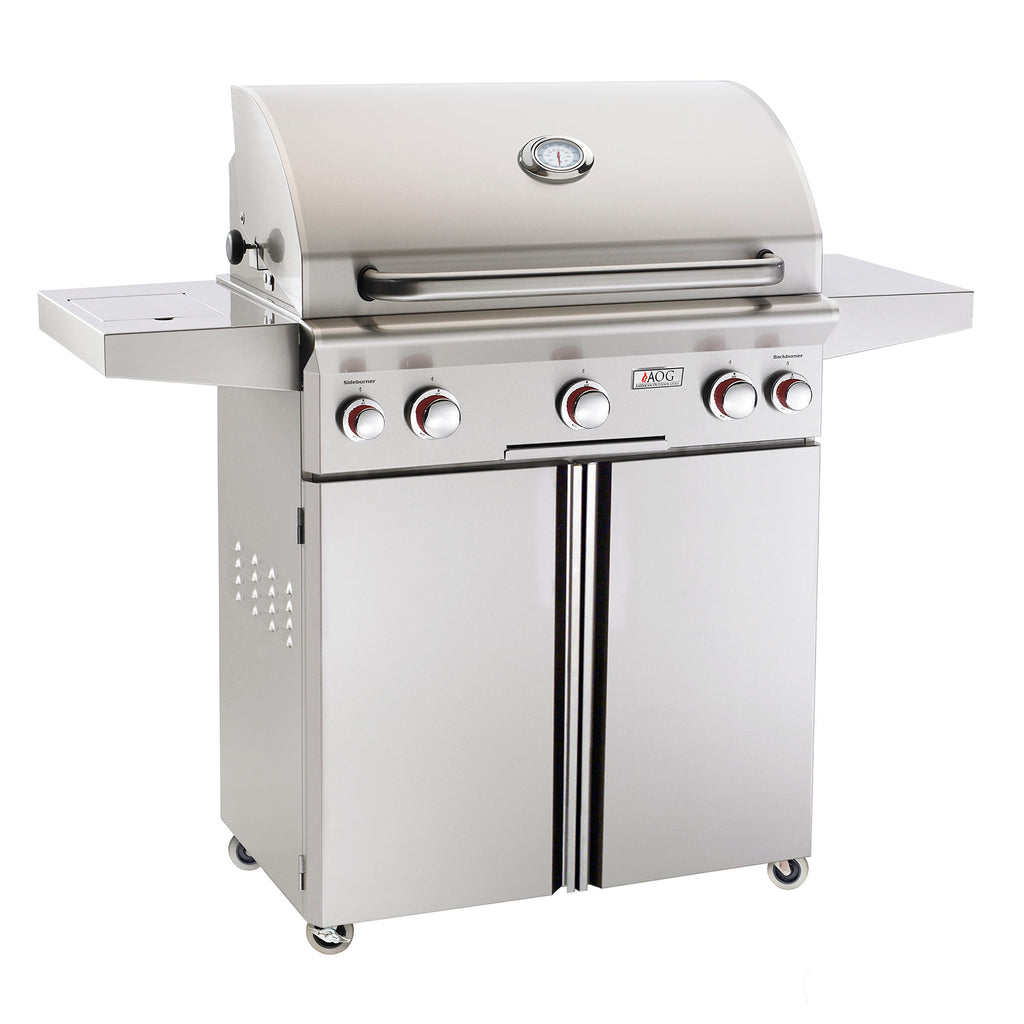 Gas grill with closed lid, front control knobs, and cabinet doors on a cart