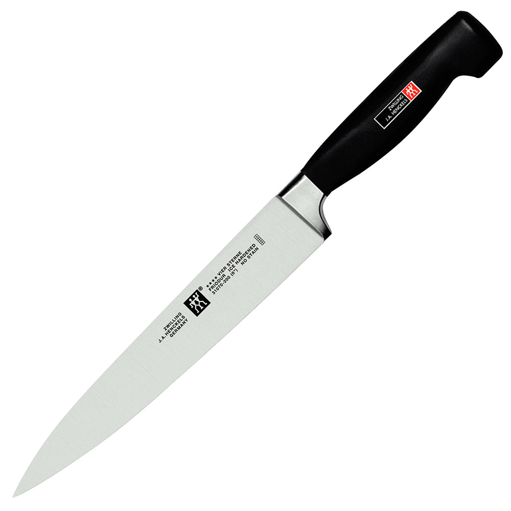 Carving knife with silver blade and black handle, Zwilling J.A. Henckels Four Star