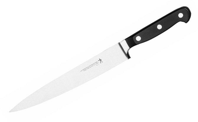 Henckels International carving knife with black handle and riveted bolster