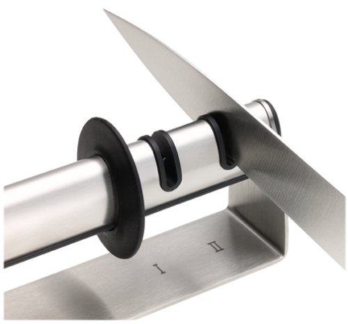 Handheld knife sharpener with stainless steel housing and black holders for two sharpening angles