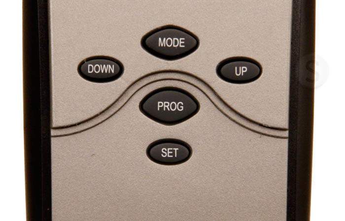 Fireplace remote control close-up of Mode, Down, Up, Prog, and Set buttons
