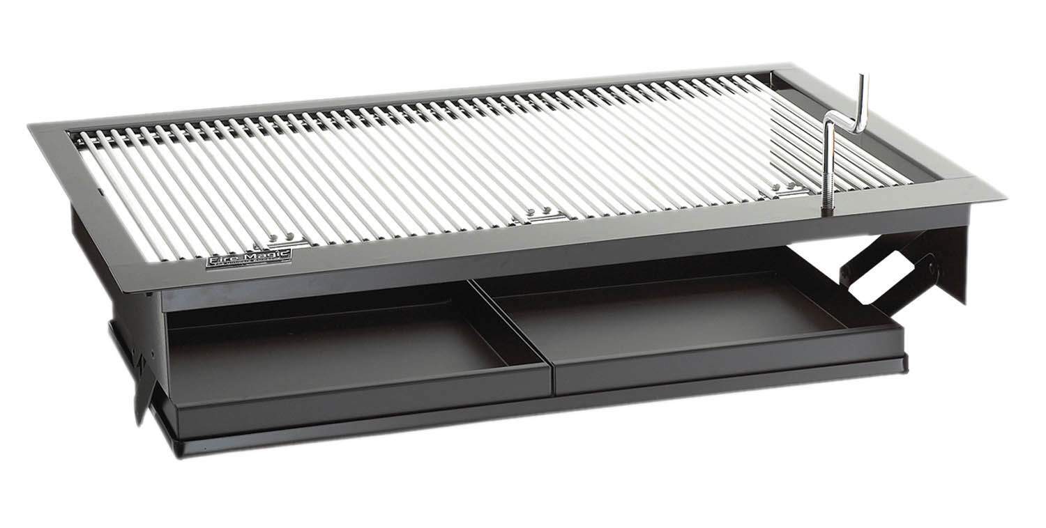 Countertop charcoal grill with slotted metal cooking grate and side handle