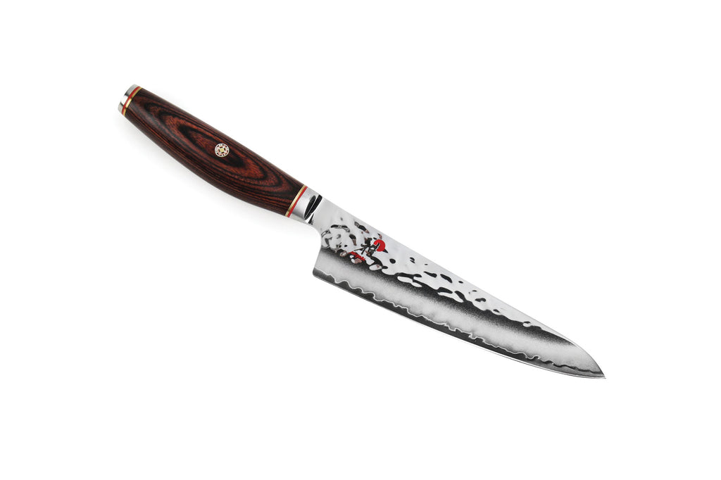 5.25-inch prep knife with patterned steel blade and dark wood handle