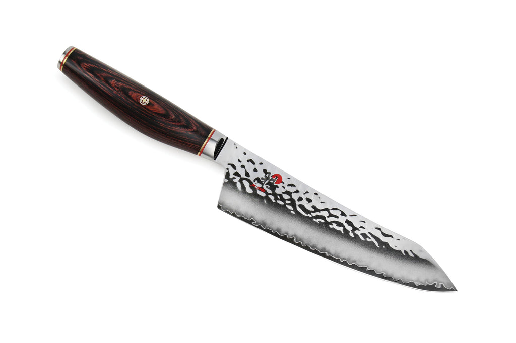 Miyabi Morimoto 7-inch rocking santoku knife with patterned steel blade, dark wood handle