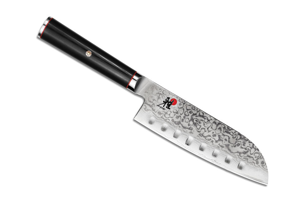 Santoku knife with Damascus-style blade and black handle, red ring at base