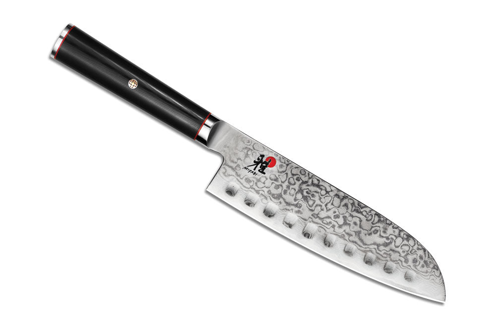 Miyabi Kaizen santoku knife, 7-inch hollow edge, black handle and damascus blade