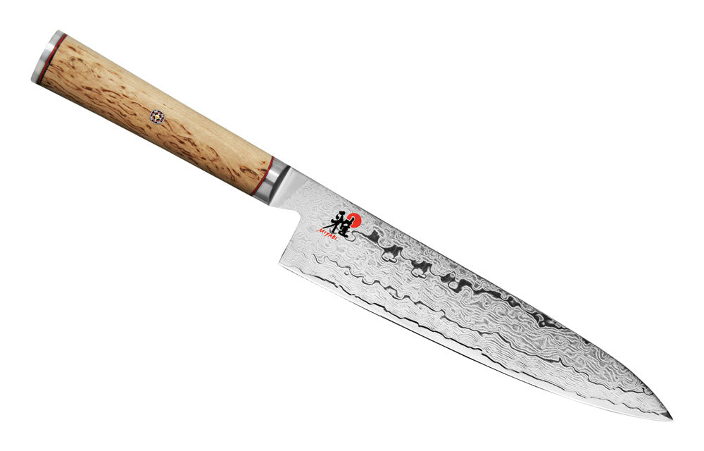 Chef's knife with birchwood handle and Damascus-style steel blade