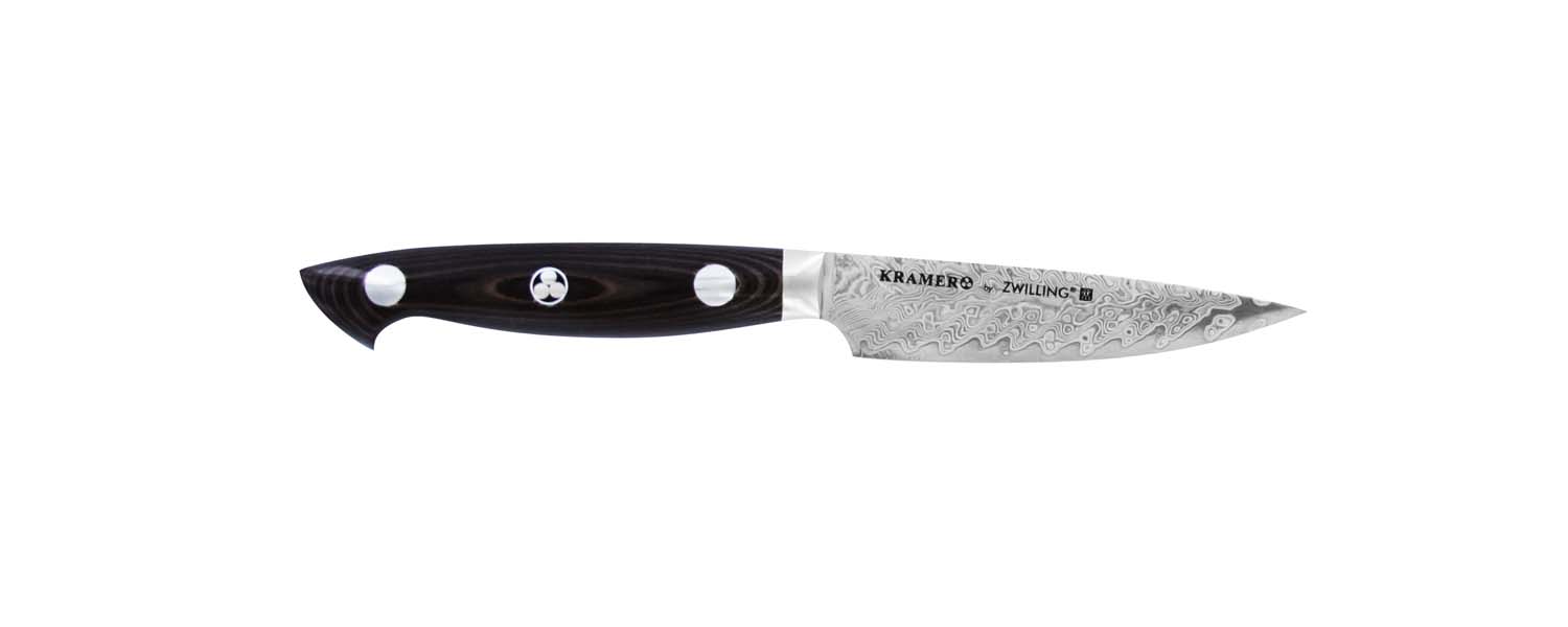 Stainless chef knife with black handle and Damascus-style patterned blade