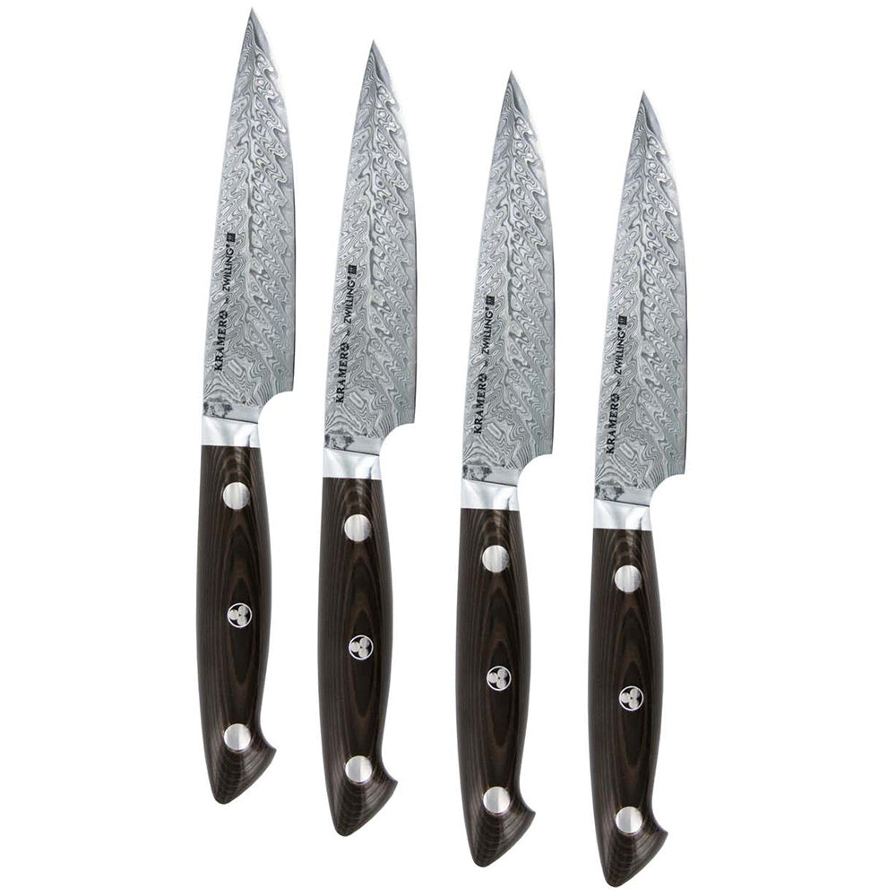4-piece steak knife set with dark wooden-style handles and stainless Damascus blades