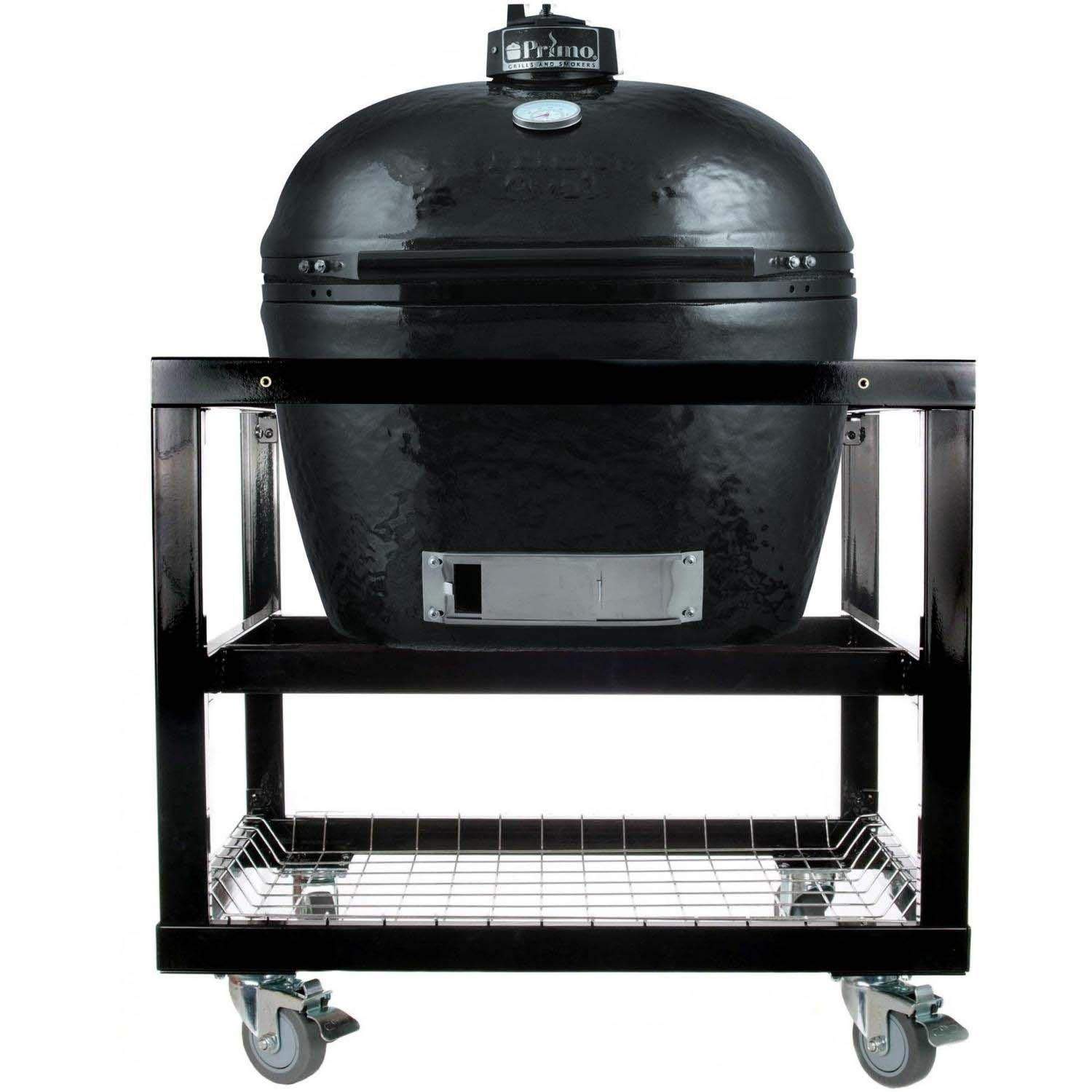 Charcoal oval ceramic kamado grill on cart with open door and lower wire grate