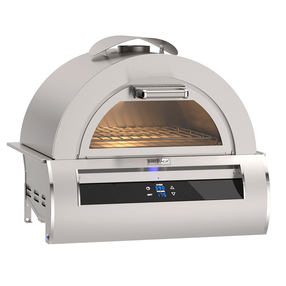 Built-in pizza oven with arched glass door, silver body, lit baking chamber