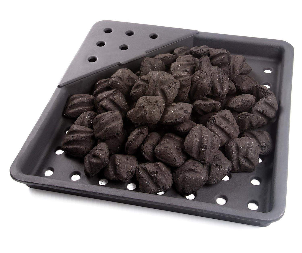 Charcoal smoker tray filled with dark briquettes and vent holes, cast iron