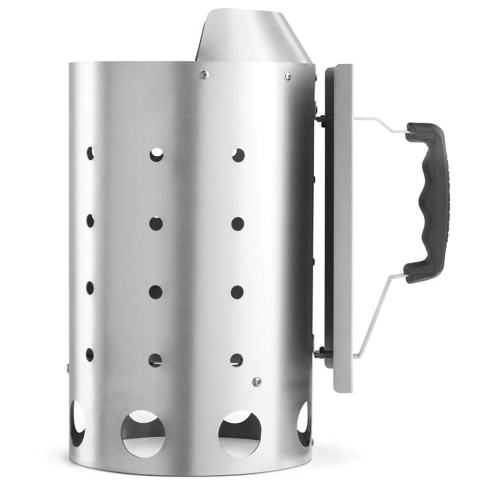 Charcoal starter chimney with side vents and swing-out handle for easy use
