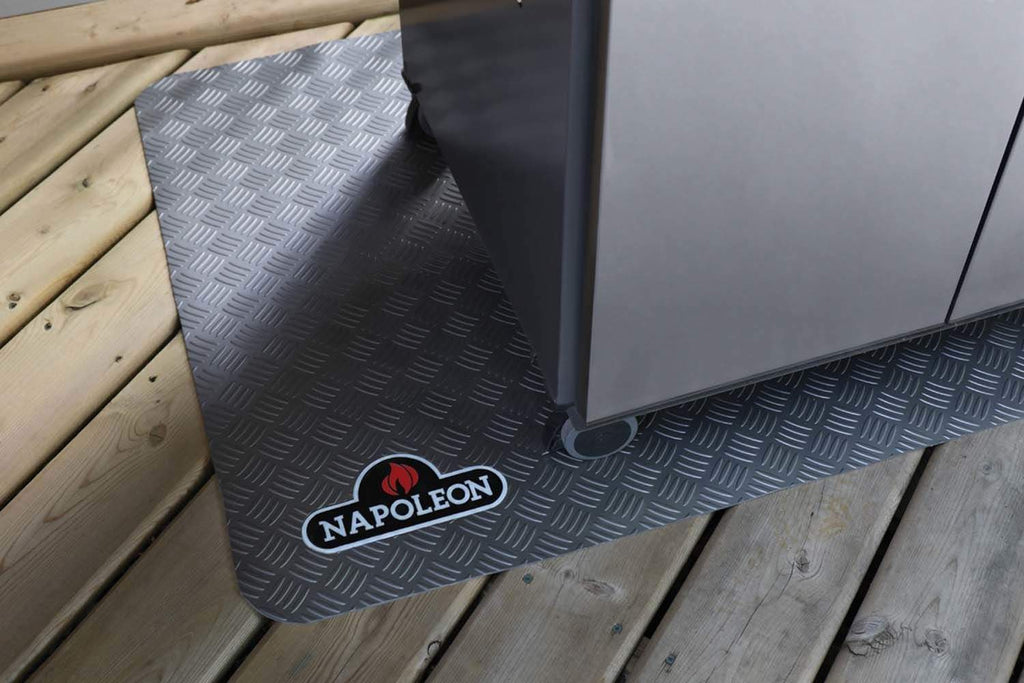 Napoleon grill mat in dark gray, diamond pattern under grill base, logo visible