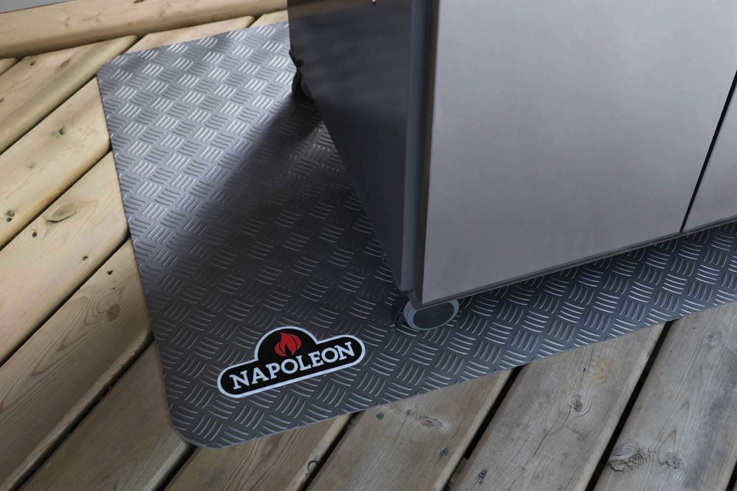 Napoleon grill mat in dark gray, diamond pattern under grill base, logo visible