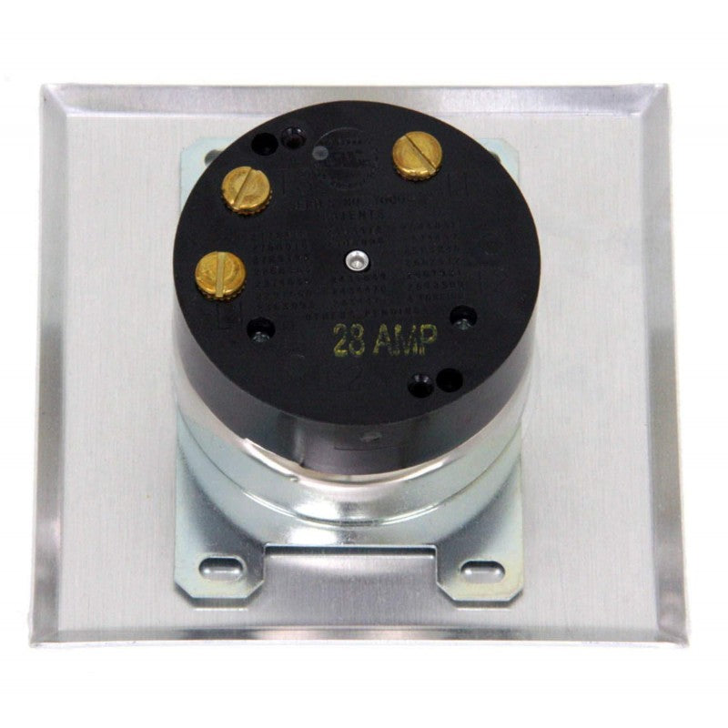 Outdoor timer mechanism inside housing with black face and brass terminals