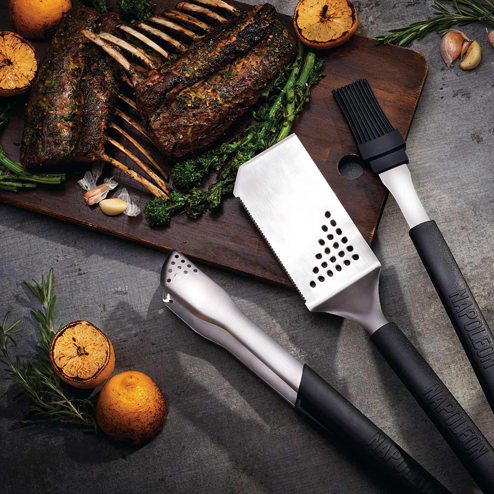 Grilling tool set with two spatulas and a turner, stainless steel heads and black grips