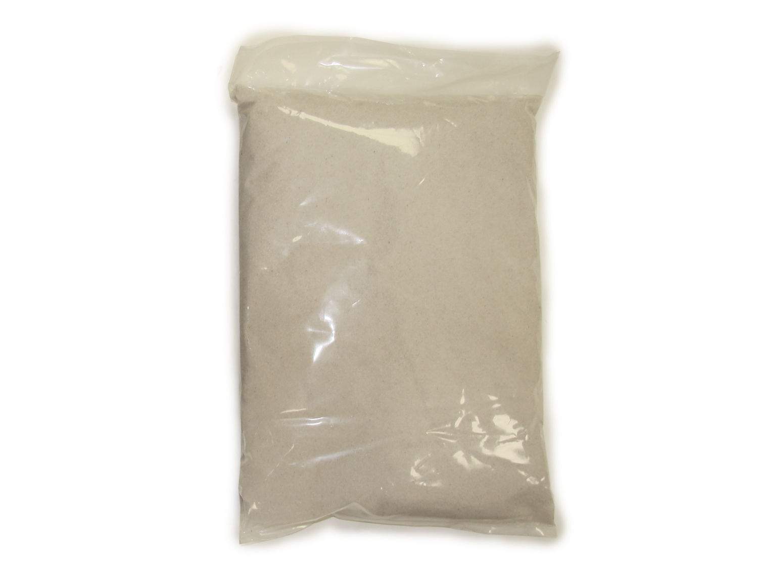 Bag of white sand sealed in clear plastic