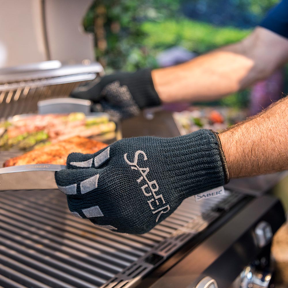 Navy knit grill gloves with Saber logo and white rectangular grip pads