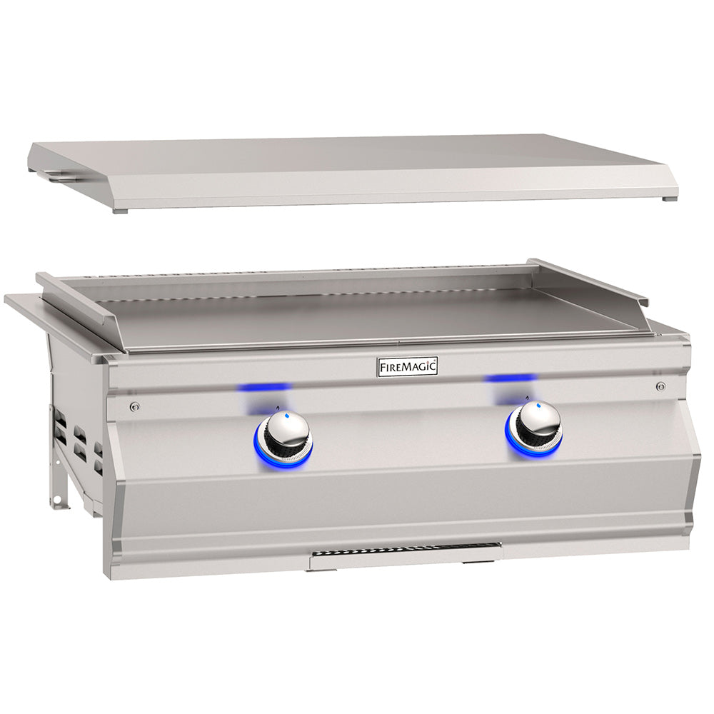 Built-in gourmet griddle with open lid, two control knobs, and stainless cooking surface
