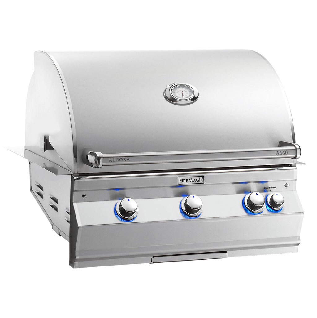 Built-in gas grill with stainless hood, burner knobs, and thermometer