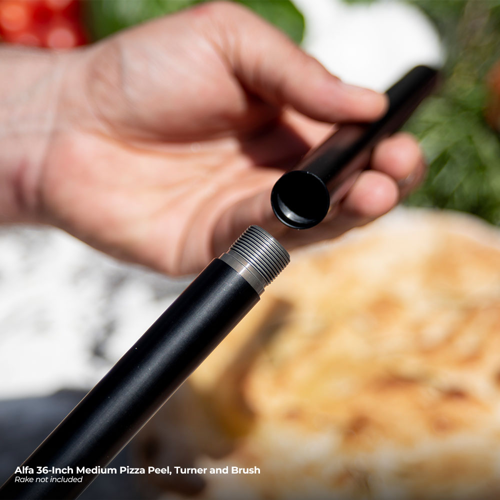 Black pizza peel handle with ribbed grip and capped end