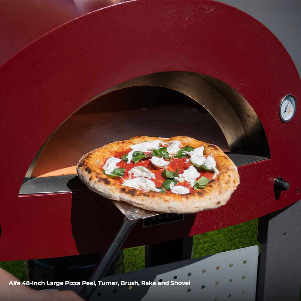 Round pizza peel holding topped pizza in an oven