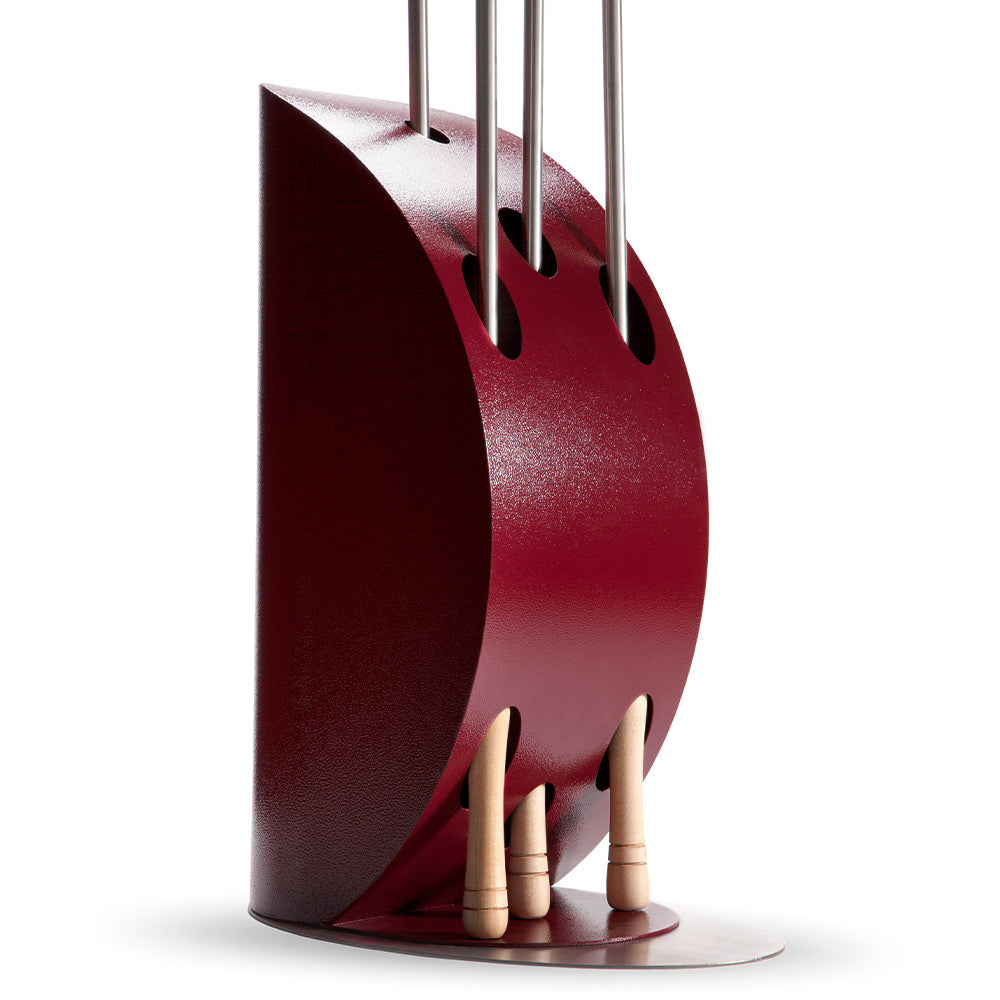 Ruby red pizza peel holder with three vertical slots and stand base