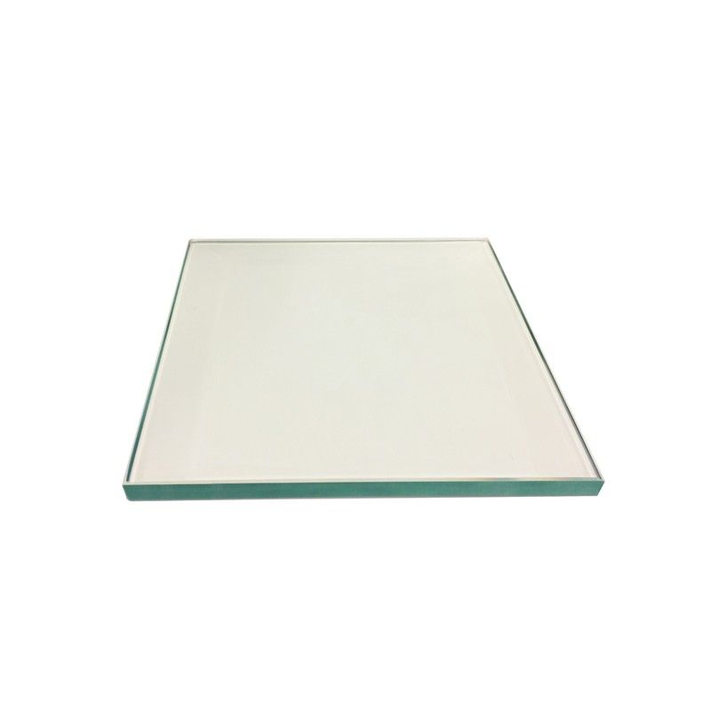 Glass hearth pad, rectangular clear glass panel with dark edge trim