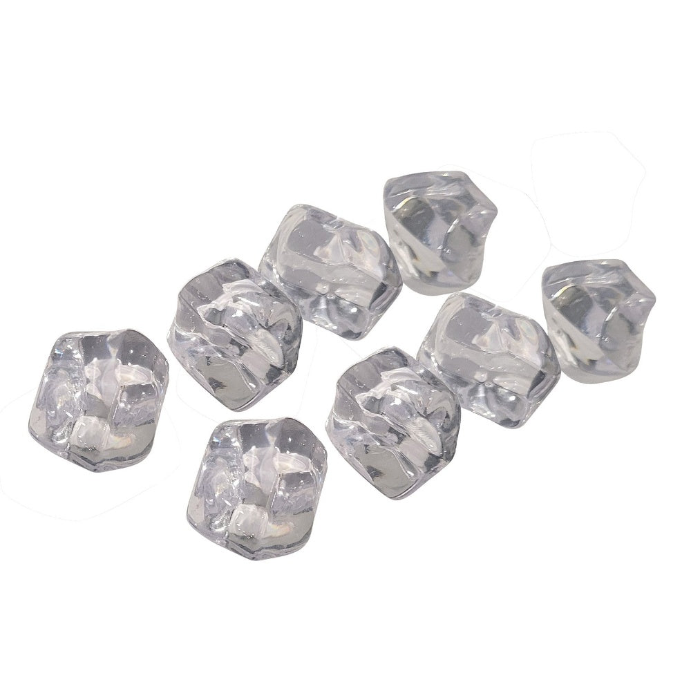 Clear acrylic crystal pieces, faceted square shapes in a small cluster