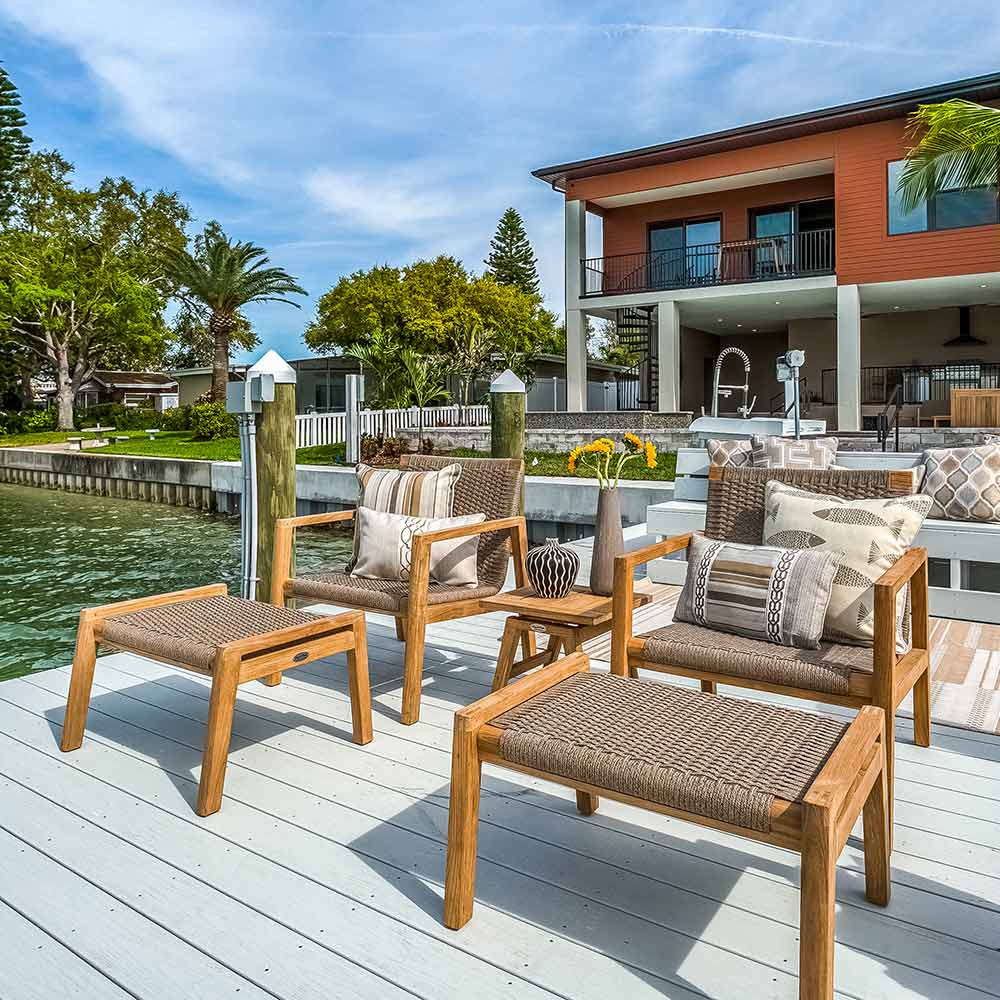 Outdoor wooden club chairs with beige woven seats and backrests, set of multiple chairs