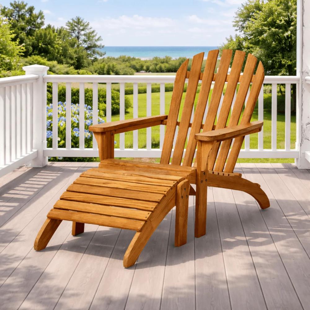 Solid teak adirondack footrest on patio with slatted top and angled legs