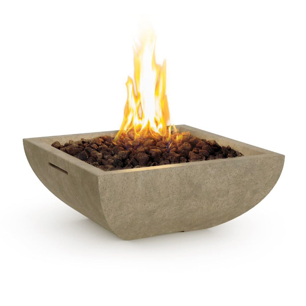 Square gas fire bowl with glowing flames and dark fire media, light beige GFRC finish