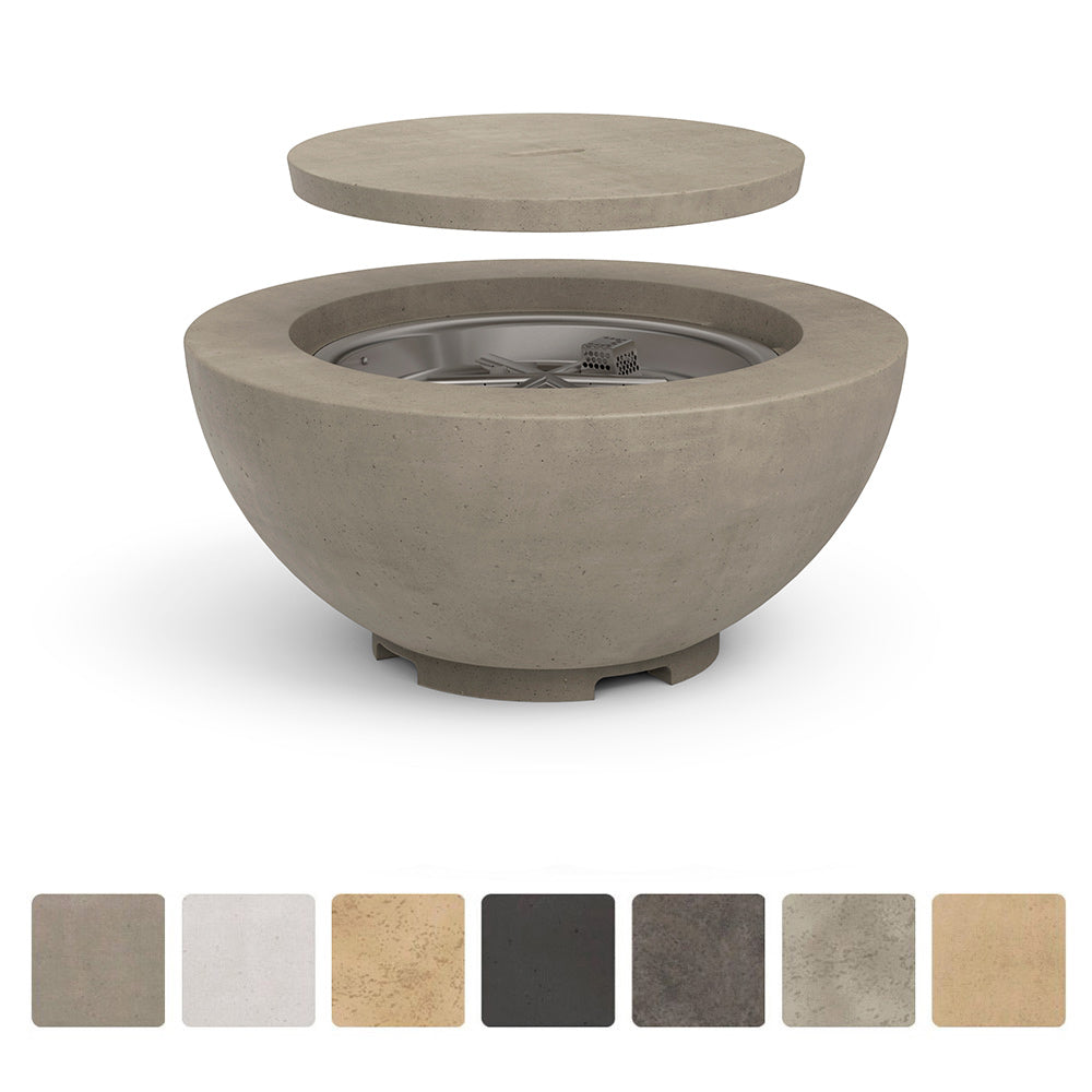 Round GFRC gas fire bowl with open burner and mesh guard in light gray concrete