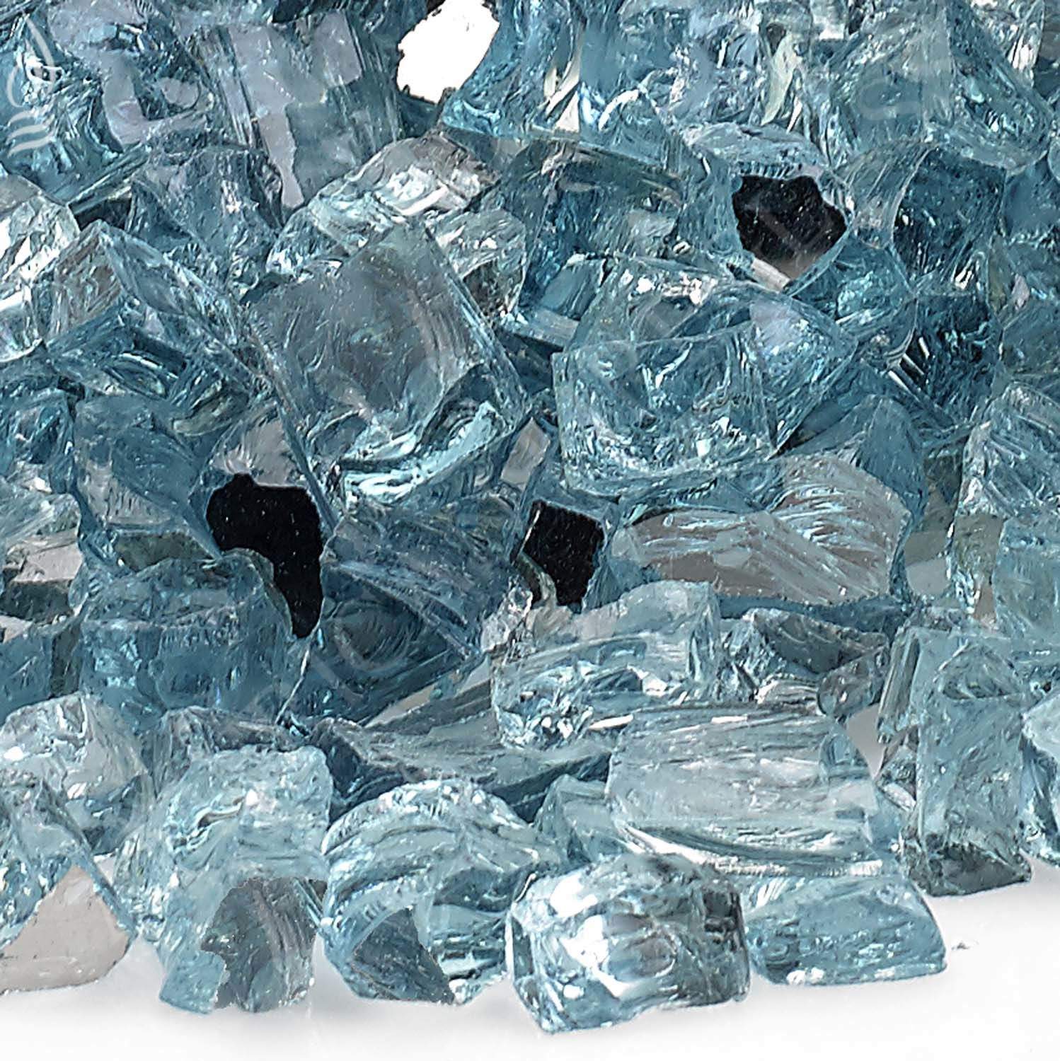 Close-up of blue glass fire pit pieces with reflective facets