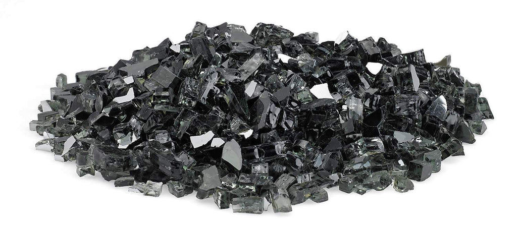 Black reflective fire glass chunks with bright facets in a long pile