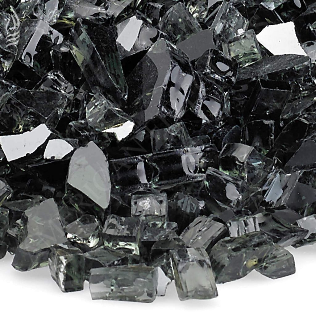 Close-up of black reflective fire glass shards with sharp reflective edges