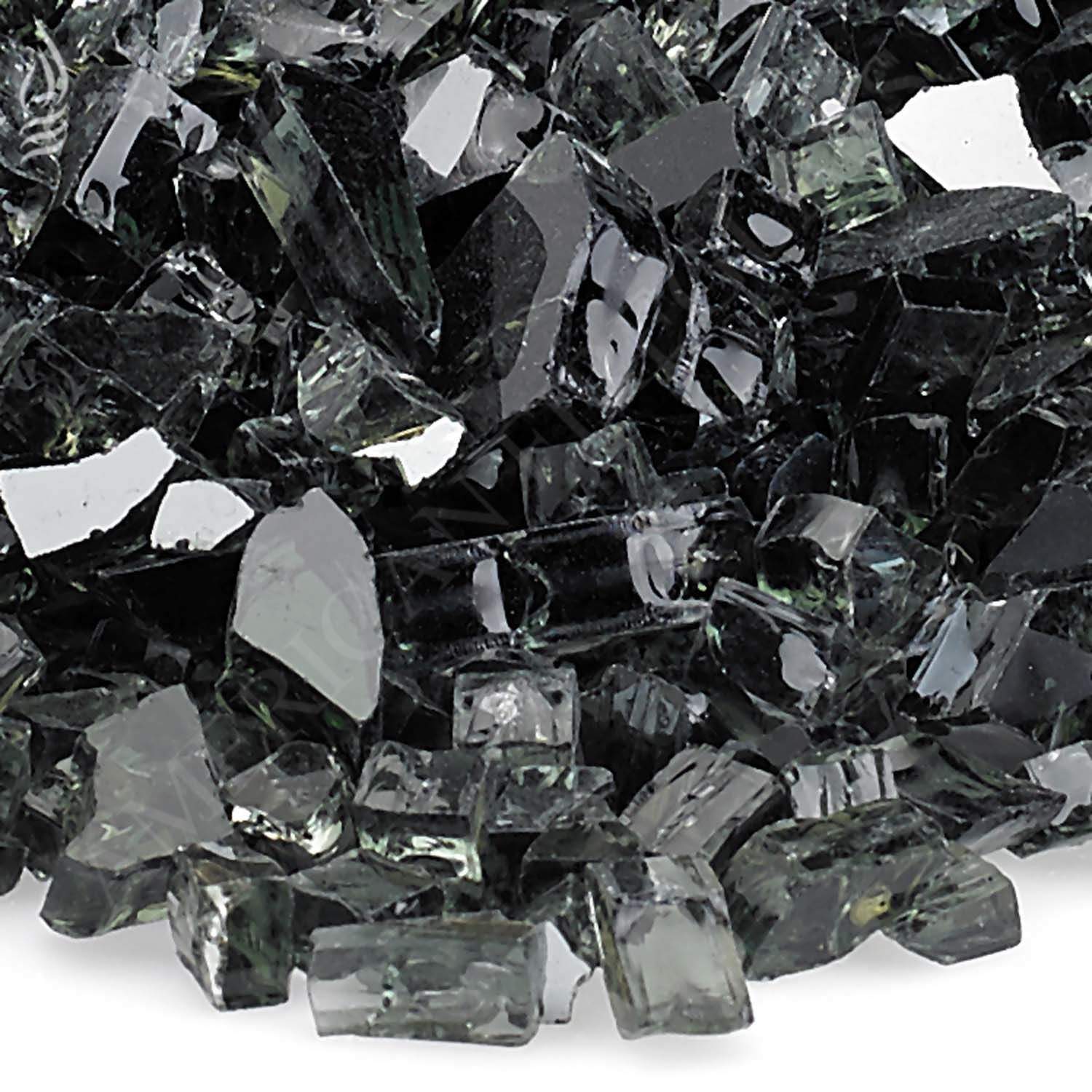 Close-up of black reflective fire glass shards with sharp reflective edges