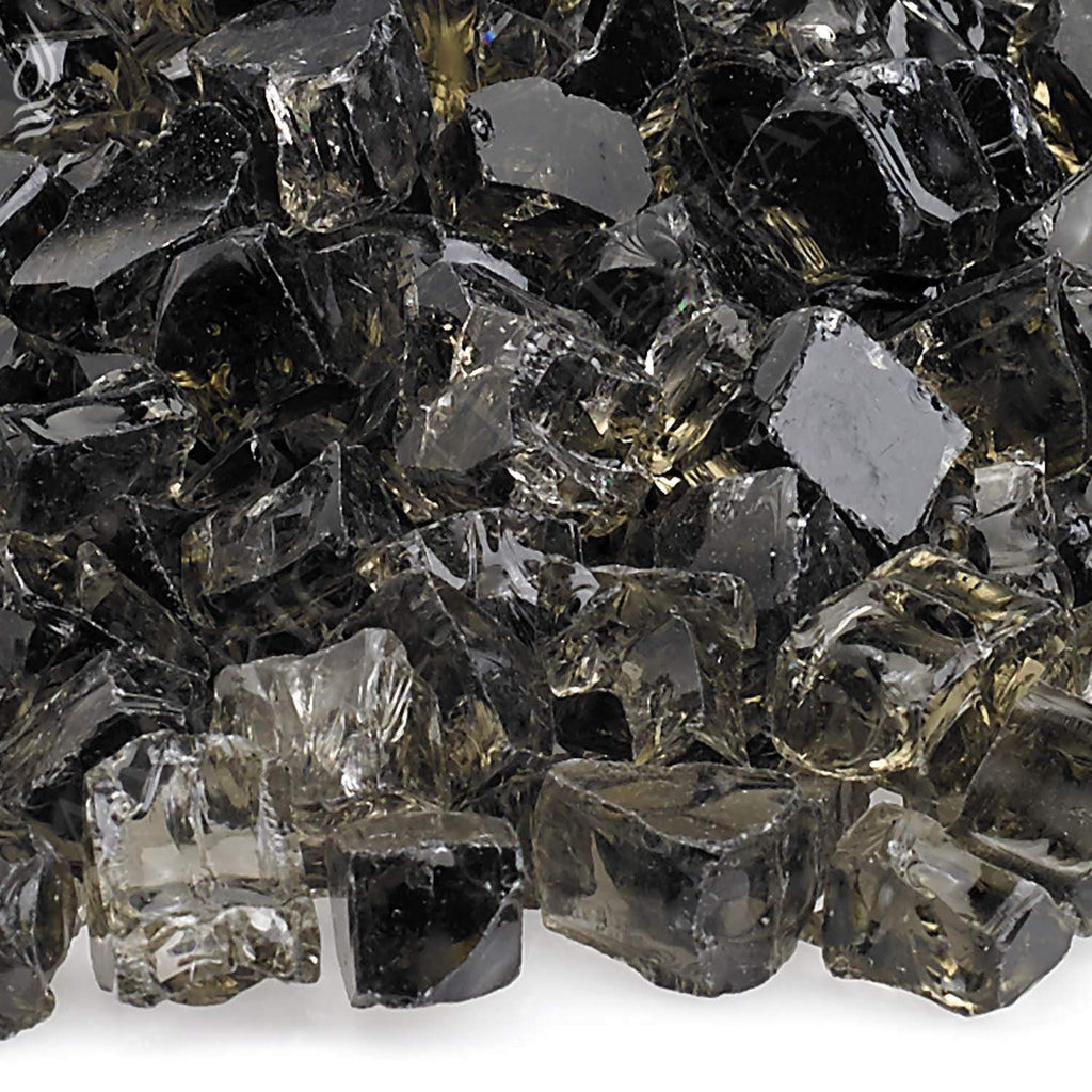 Fire glass close-up of dark and clear faceted cube fragments with sparkle