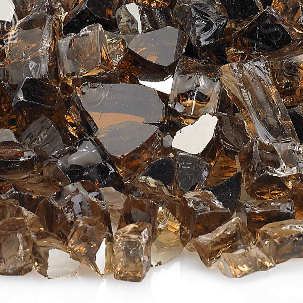 Close-up copper reflective fire glass, faceted dark brown stones with amber glow