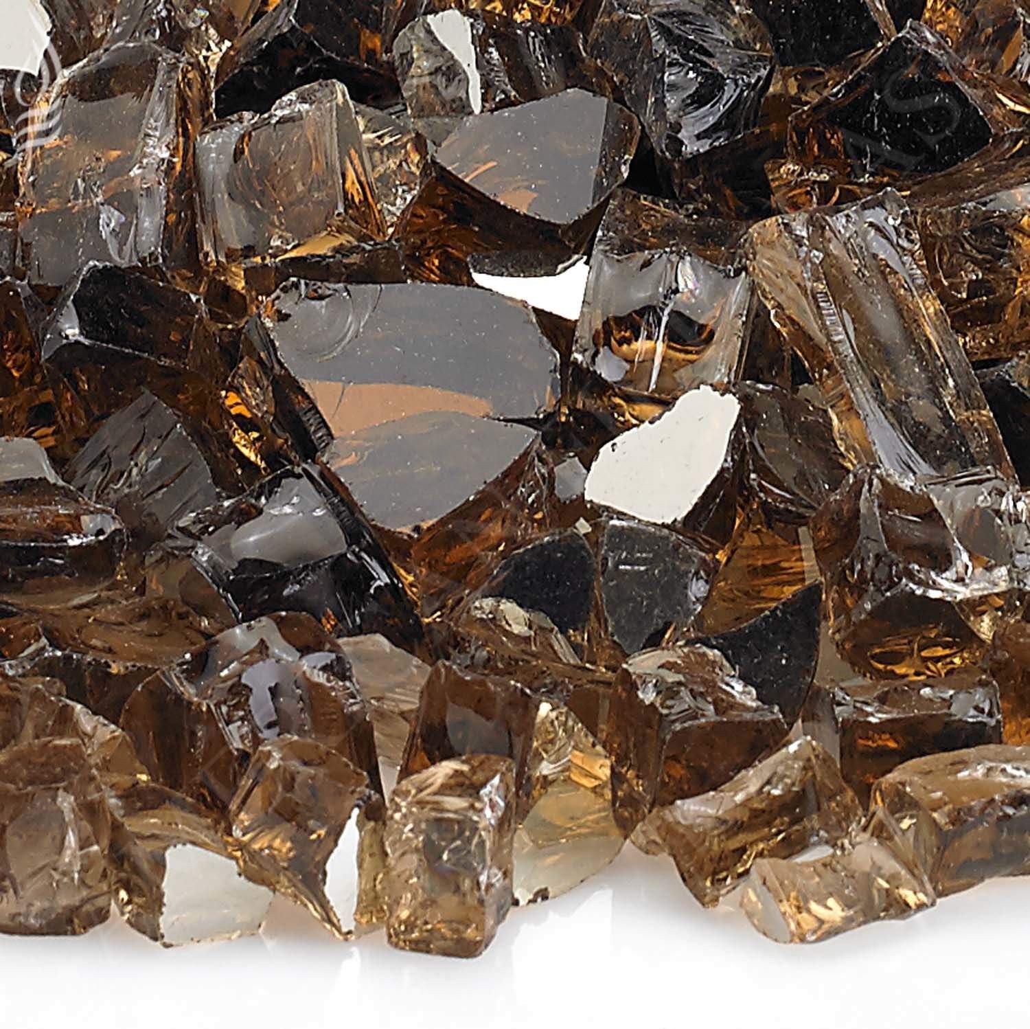 Close-up copper reflective fire glass, faceted dark brown stones with amber glow