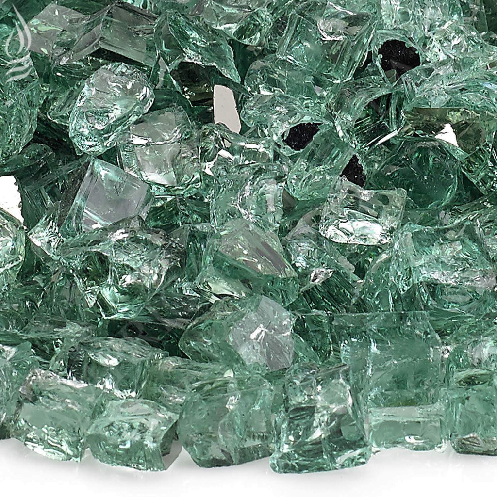 Green reflective fire glass chunks with sharp, sparkling facets close-up