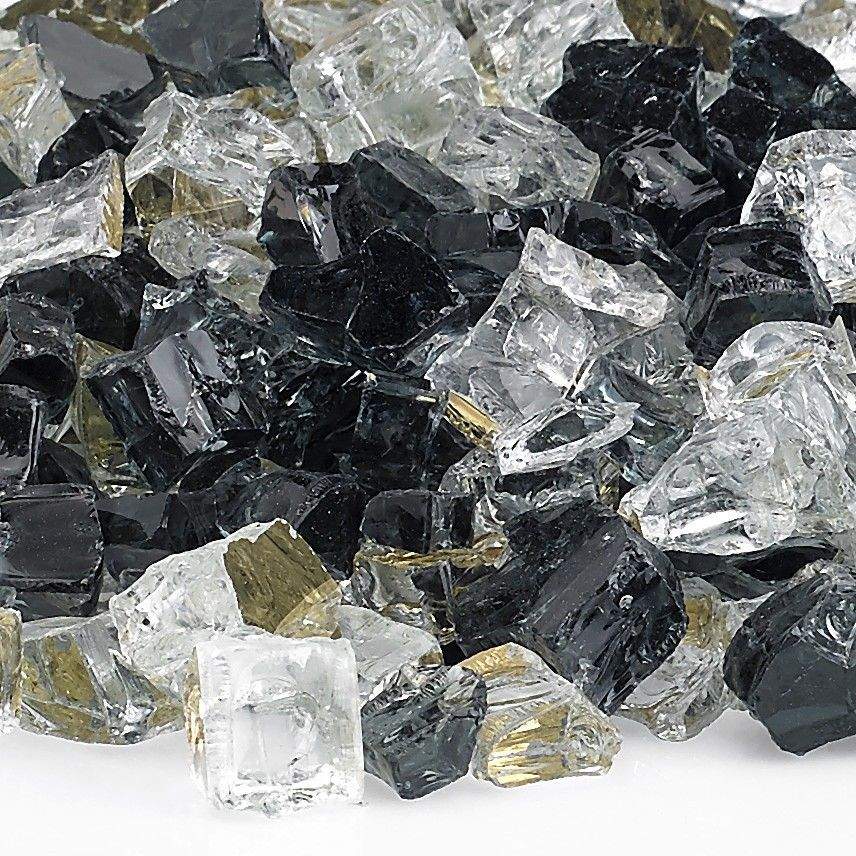 Reflective fire glass pieces close-up in black, clear, and gold reflective shards