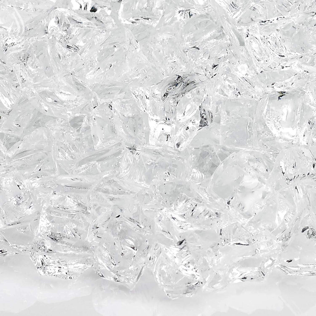 Close-up of clear fire glass chunks with faceted, transparent texture